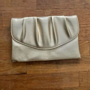 Vintage gold metallic clutch purse. Mint condition.